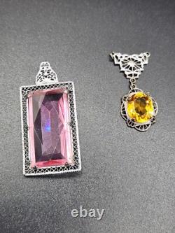 A Pair of Vintage Art Deco Ornate Yellow and Pink Stone Silver Tone Pendants