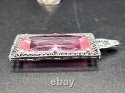 A Pair of Vintage Art Deco Ornate Yellow and Pink Stone Silver Tone Pendants
