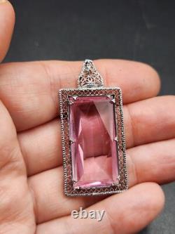 A Pair of Vintage Art Deco Ornate Yellow and Pink Stone Silver Tone Pendants