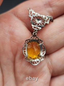 A Pair of Vintage Art Deco Ornate Yellow and Pink Stone Silver Tone Pendants