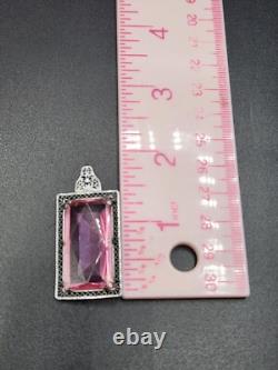 A Pair of Vintage Art Deco Ornate Yellow and Pink Stone Silver Tone Pendants