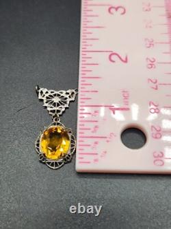 A Pair of Vintage Art Deco Ornate Yellow and Pink Stone Silver Tone Pendants