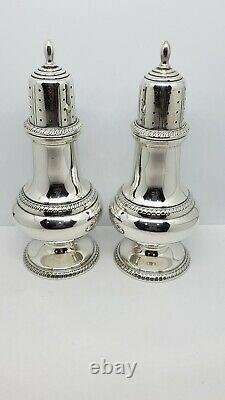 A Pair of Vintage Solid STERLING SILVER SALT & PEPPER SHAKERS