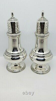 A Pair of Vintage Solid STERLING SILVER SALT & PEPPER SHAKERS
