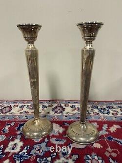 A Vintage Pair of Sterling Silver Candlesticks