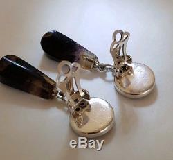 A vintage pair of sterling silver Drop Earrings. Collet set with Blue John