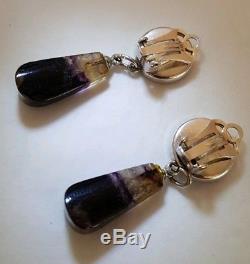 A vintage pair of sterling silver Drop Earrings. Collet set with Blue John