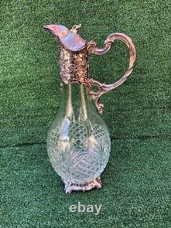 Antique/ Vintage pair silver plate and glass claret jugs