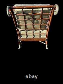 Exceptional Pair Of Vintage Coastal Rattan Lounge Chairs With Scroll Design