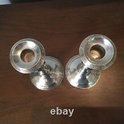 PAIR-VINTAGE GENOVA SILVER CO. STERLING SILVER CANDLE HOLDER. 50s