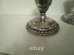 PAIR of LA PIERRE VINTAGE WEIGHTED SILVER CANDLESTICK HOLDERS HALLMARKED