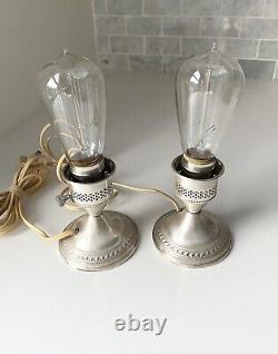 Pair Of Vintage Crest Silver Co. Sterling weighted hurrican lamps. Tested/Work