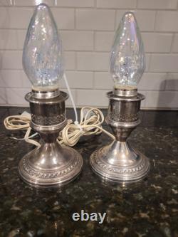 Pair Of Vintage Crest Silver Co. Sterling weighted hurrican lamps. Tested/Work
