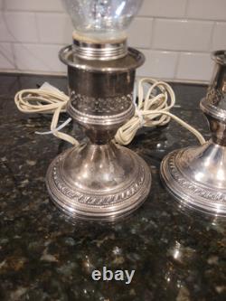 Pair Of Vintage Crest Silver Co. Sterling weighted hurrican lamps. Tested/Work