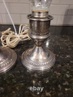 Pair Of Vintage Crest Silver Co. Sterling weighted hurrican lamps. Tested/Work