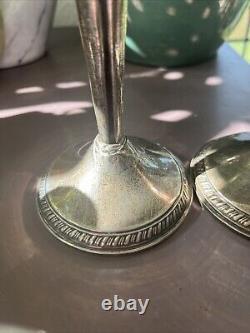Pair of vintage CROWN sterling silver weighted 8 1/4 h. Candlesticks