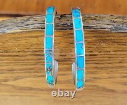 Pair of vintage Native American silver and inlaid turquoise bracelets, small