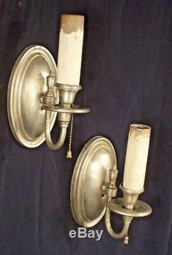 VINTAGE PAIR OF EARLY 20th CENTURY REGENCY OVAL BACK SILVER PLATE SCONCES