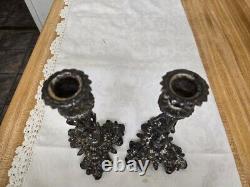 Vtg. Silverplate figural candlesticks on base pair, unmarked