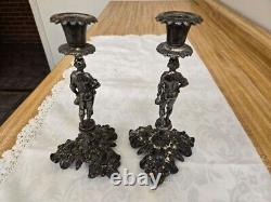 Vtg. Silverplate figural candlesticks on base pair, unmarked