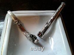 Belle paire de porte-cigarettes vintage en argent ornés de gems (1 dragon)