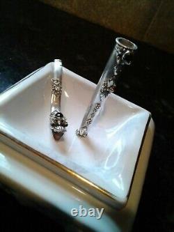 Belle paire de porte-cigarettes vintage en argent ornés de gems (1 dragon)