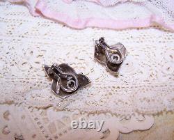 Boucles d'oreilles clip Vintage Tiffany & Co. en argent sterling à ruban plié