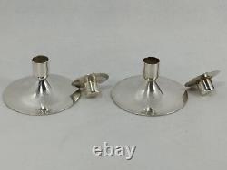 Paire de bougeoirs en argent 800 vintage