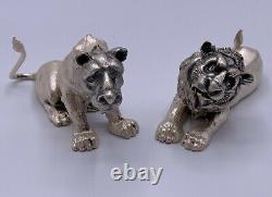 Paire de figurines en argent sterling vintage représentant un lion et une lionne signée fait main.