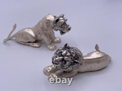 Paire de figurines en argent sterling vintage représentant un lion et une lionne signée fait main.