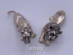 Paire de figurines en argent sterling vintage représentant un lion et une lionne signée fait main.