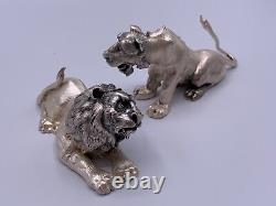 Paire de figurines en argent sterling vintage représentant un lion et une lionne signée fait main.