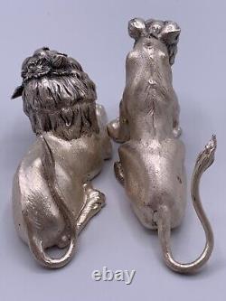 Paire de figurines en argent sterling vintage représentant un lion et une lionne signée fait main.