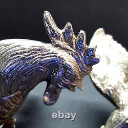 Paire de sculptures décoratives de coqs de combat en argent vintage