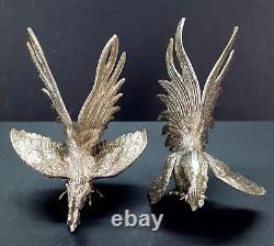 Paire de sculptures décoratives de coqs de combat en argent vintage