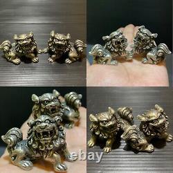 Rare paire ancienne d'argent de foo dogs jumeaux hautement décorés