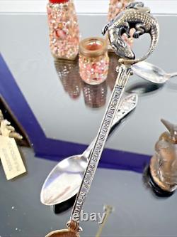 Souvenirs vintage et antiques de Floride en argent, alligator, pélican, salières et poivrières