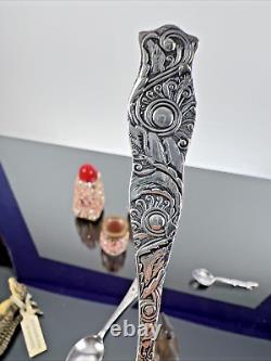 Souvenirs vintage et antiques de Floride en argent, alligator, pélican, salières et poivrières