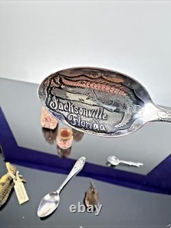 Souvenirs vintage et antiques de Floride en argent, alligator, pélican, salières et poivrières